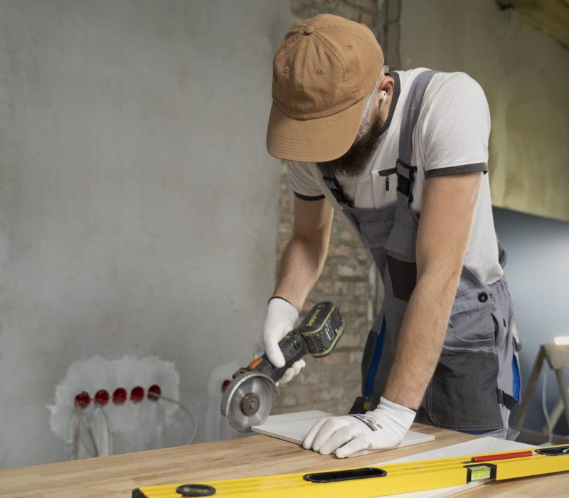 tiler-working-renovation-apartment